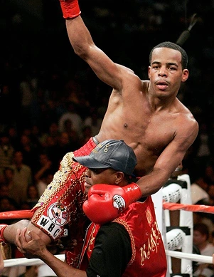 Zahir “King” Raheem celebrates his win over Erik Morales, of Tijuana, Mexico, in a bout billed as "Double Trouble."